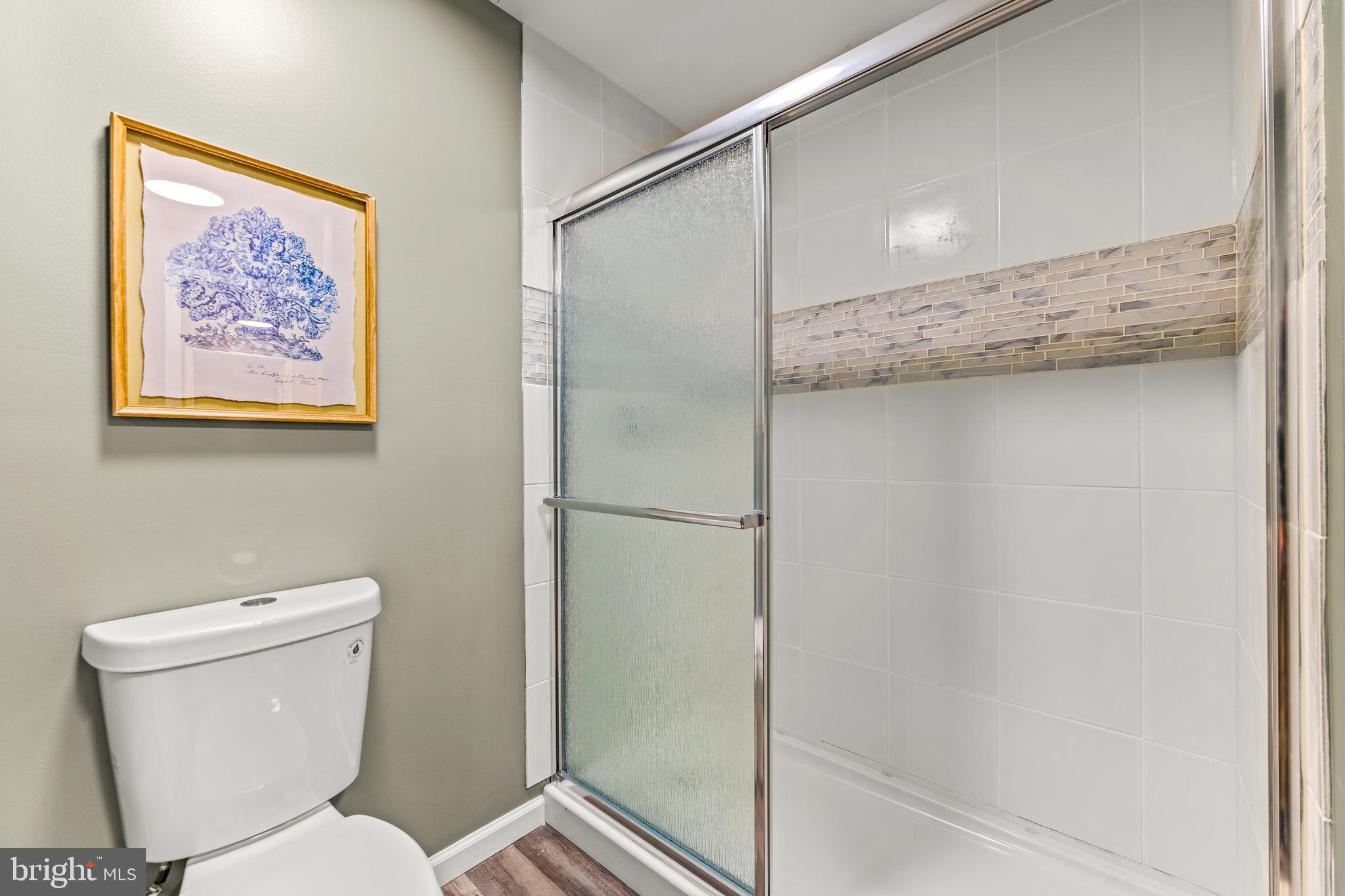 1717 Maco Drive Hanover, MD 21076 - Photo 73 of 93 a bathroom with a toilet and a shower