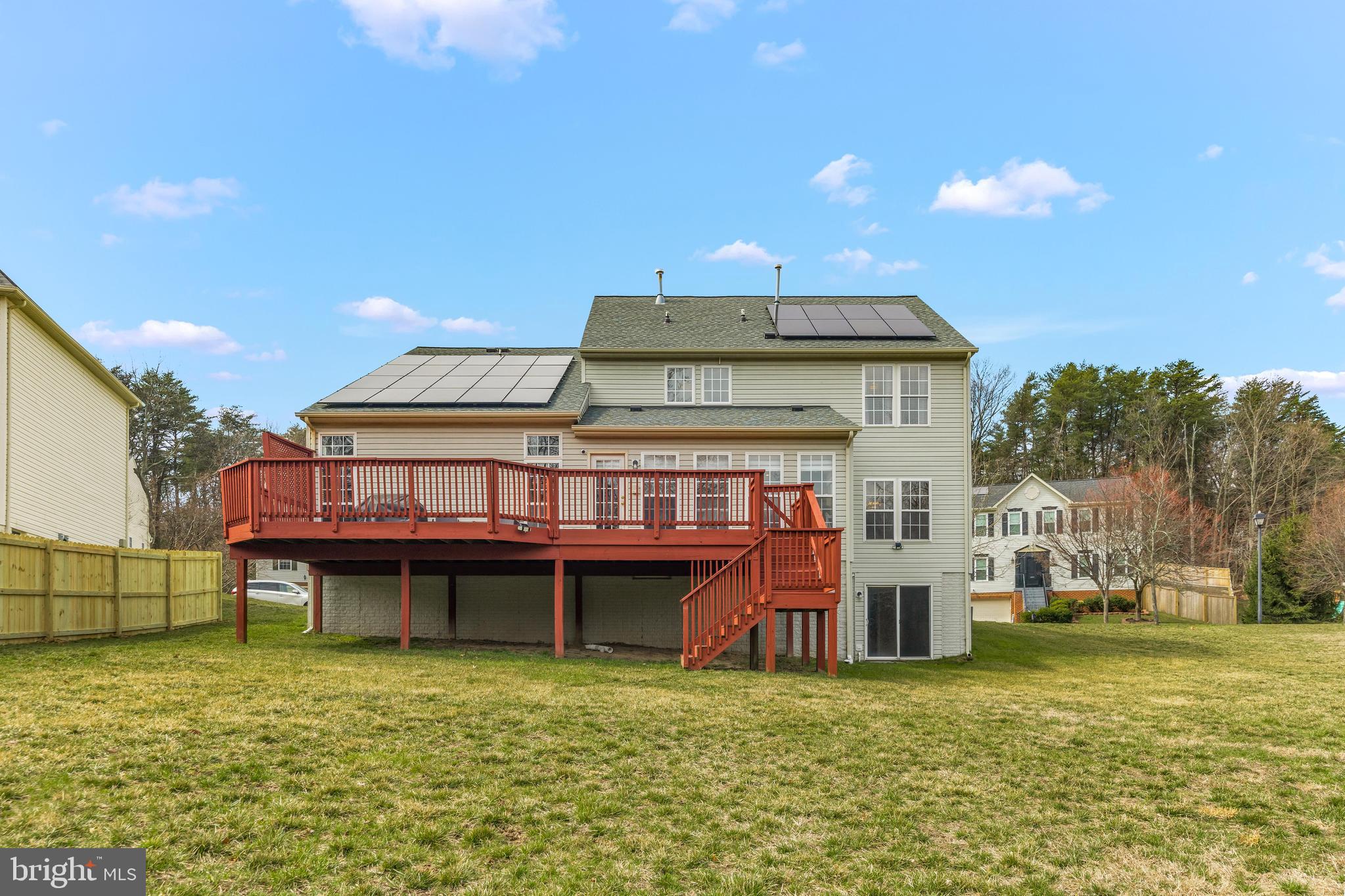 1717 Maco Drive Hanover, MD 21076 - Photo 79 of 93 a view of a big house with a chairs and table in a patio