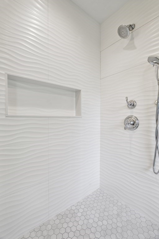 18-20 Athelstane Road Newton, MA 02459 - Photo 11 of 21 a bathroom with a shower