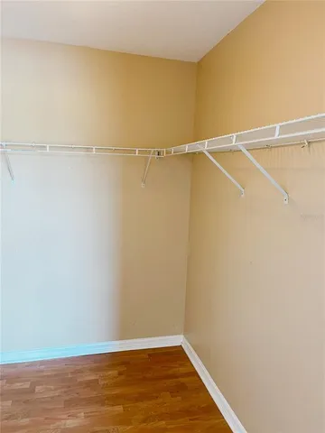 a view of a kitchen from the hallway