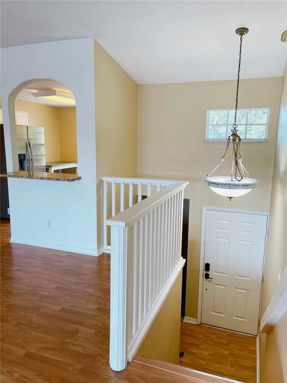 427 Eagle Ridge Drive Davenport, FL 33837 - Photo 20 of 39 a view of a hallway view with staircase