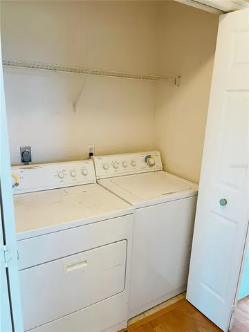 a bathroom with a toilet and a bath tub