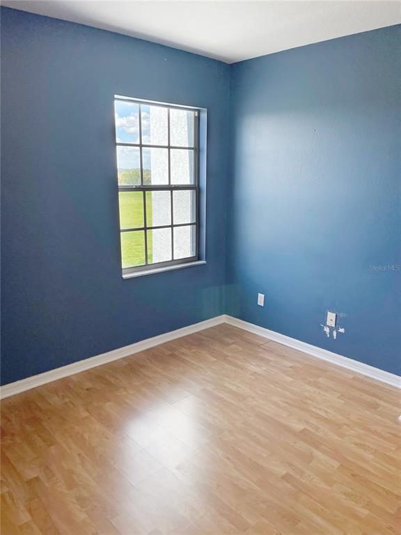 427 Eagle Ridge Drive Davenport, FL 33837 - Photo 38 of 39 an empty room with a window