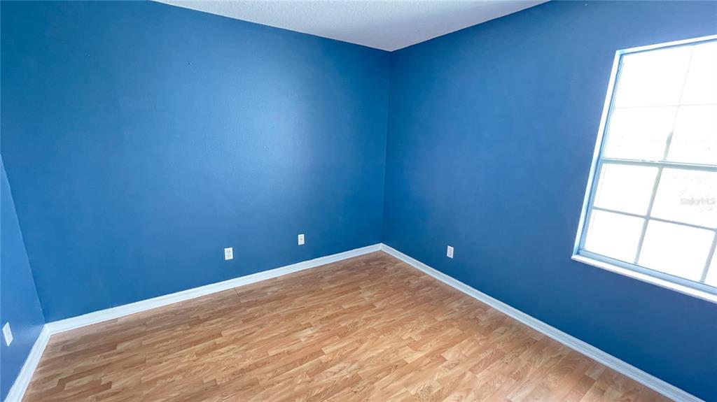 427 Eagle Ridge Drive Davenport, FL 33837 - Photo 6 of 39 a view of empty room with window