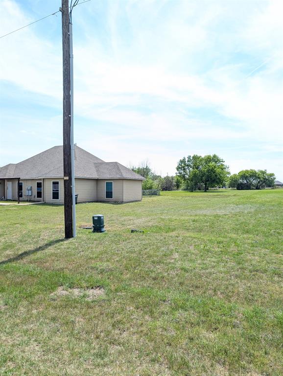 120 Collett Court Weatherford, TX 76088 - Photo 2 of 10 a view of a house with a big yard
