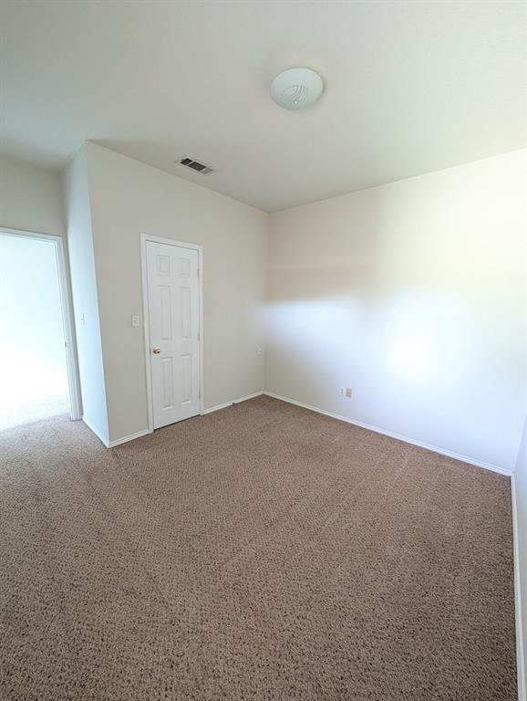 120 Collett Court Weatherford, TX 76088 - Photo 8 of 10 a view of an empty room and a window