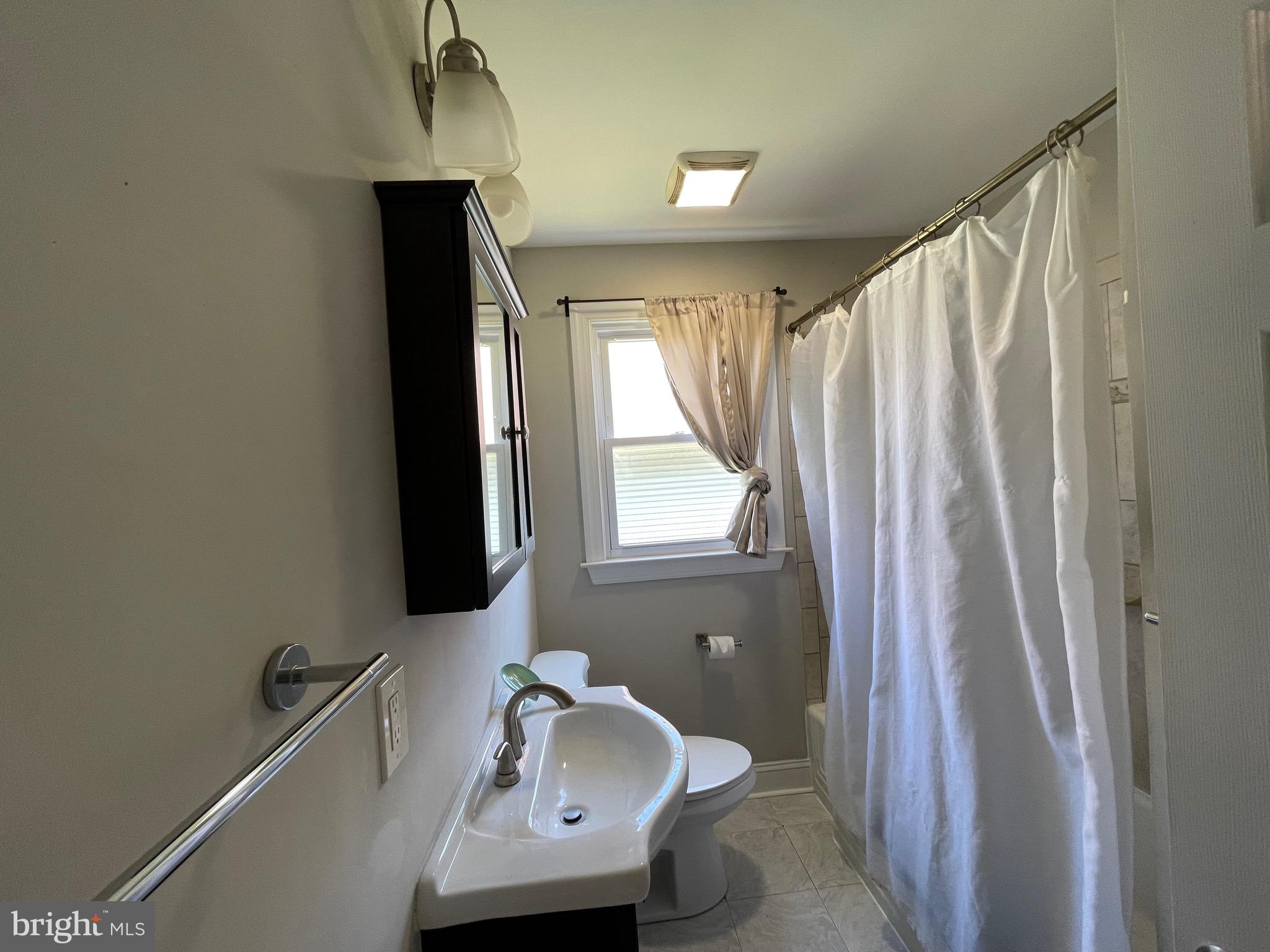 1227 64th Street Rosedale, MD 21237 - Photo 4 of 9 Main level bathroom
