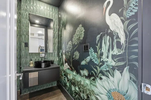 a bathroom with a sink and a mirror