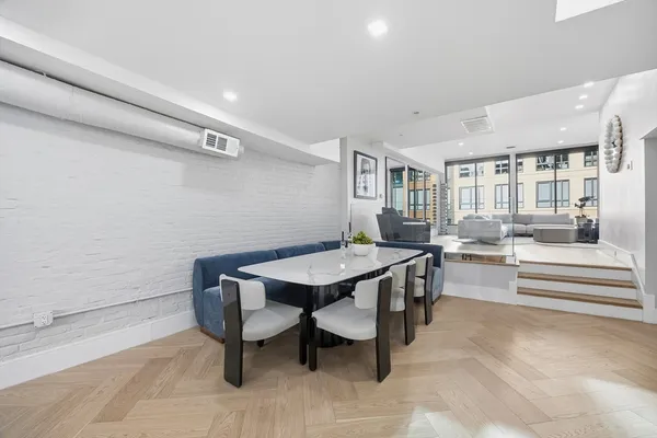 a view of a dining room with furniture