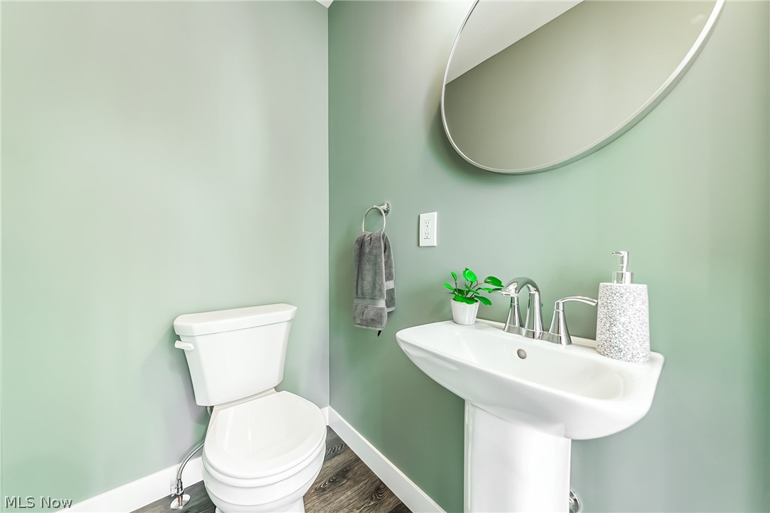 3959 Ardmore Road Cleveland Heights, OH 44121 - Photo 14 of 38 Bathroom with hardwood / wood-style floors, sink, and toilet