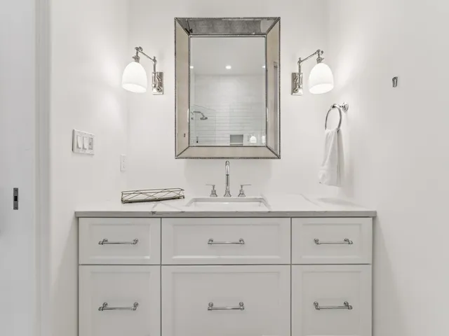 a bathroom with a toilet and shower