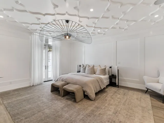 a spacious bathroom with a bathtub and shower