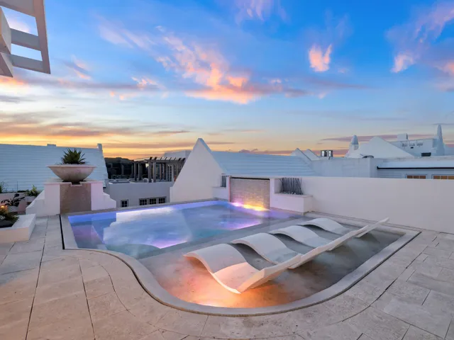 a view of a house with a flower plants