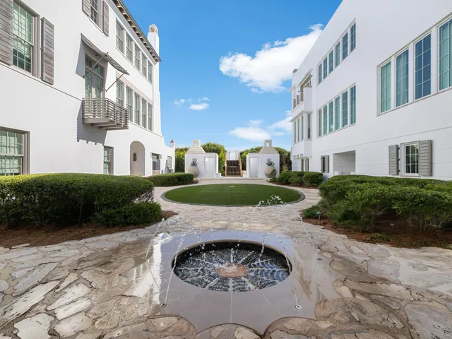 a view of a balcony with wooden floor