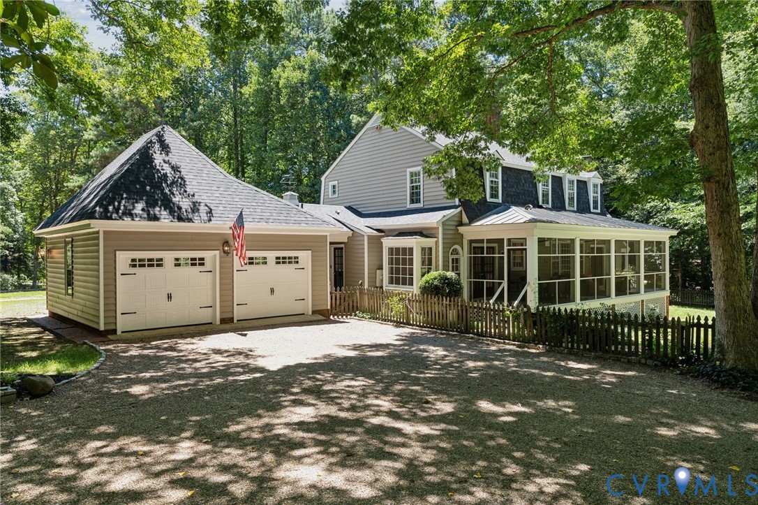 9100 Broadstone Road Chesterfield, VA 23236 - Photo 26 of 33 Rear view of the home with 2 car garage, large scr