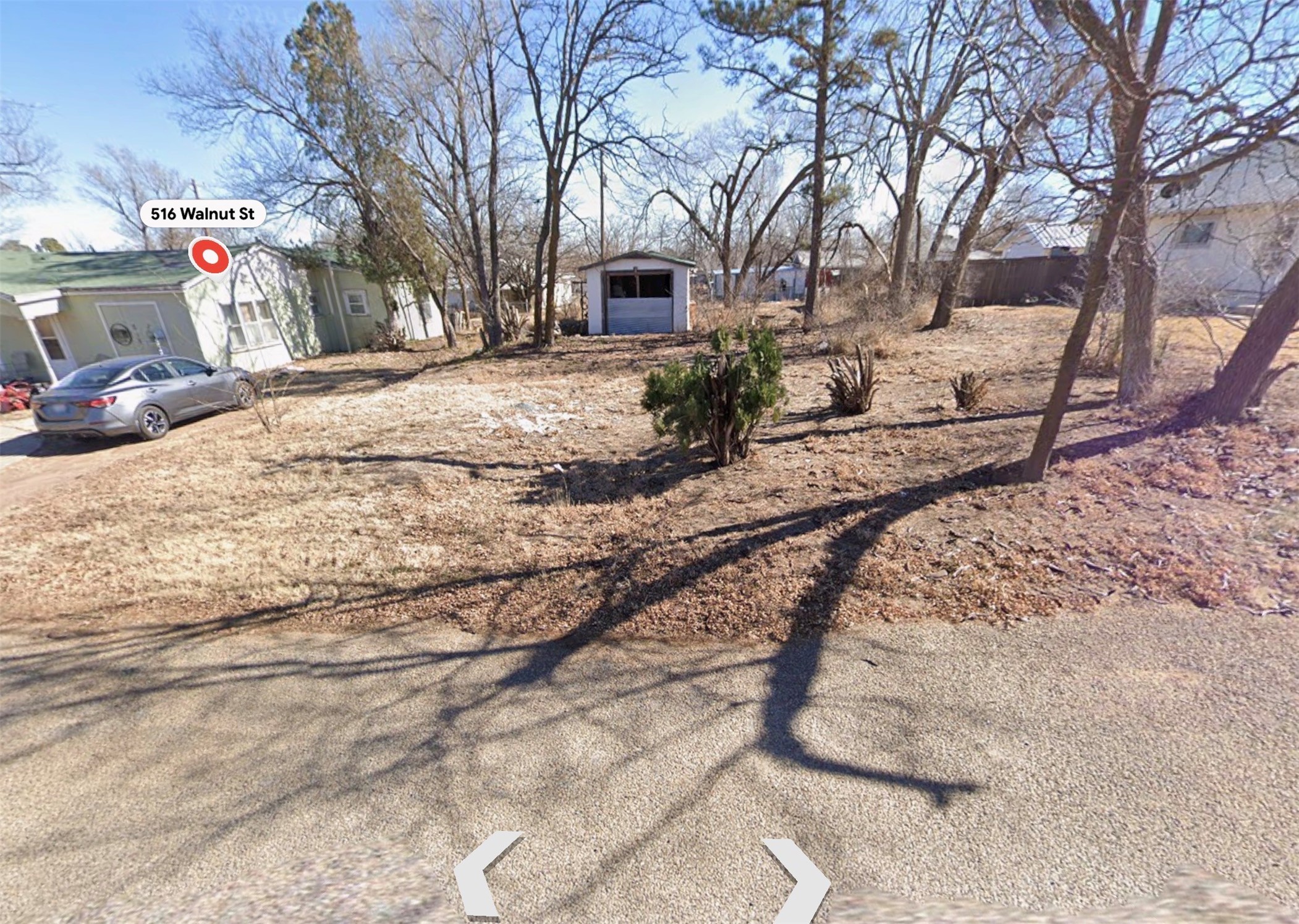 516 Walnut Street McLean, TX 79057 - Photo 11 of 12 a view of a yard with snow on the road