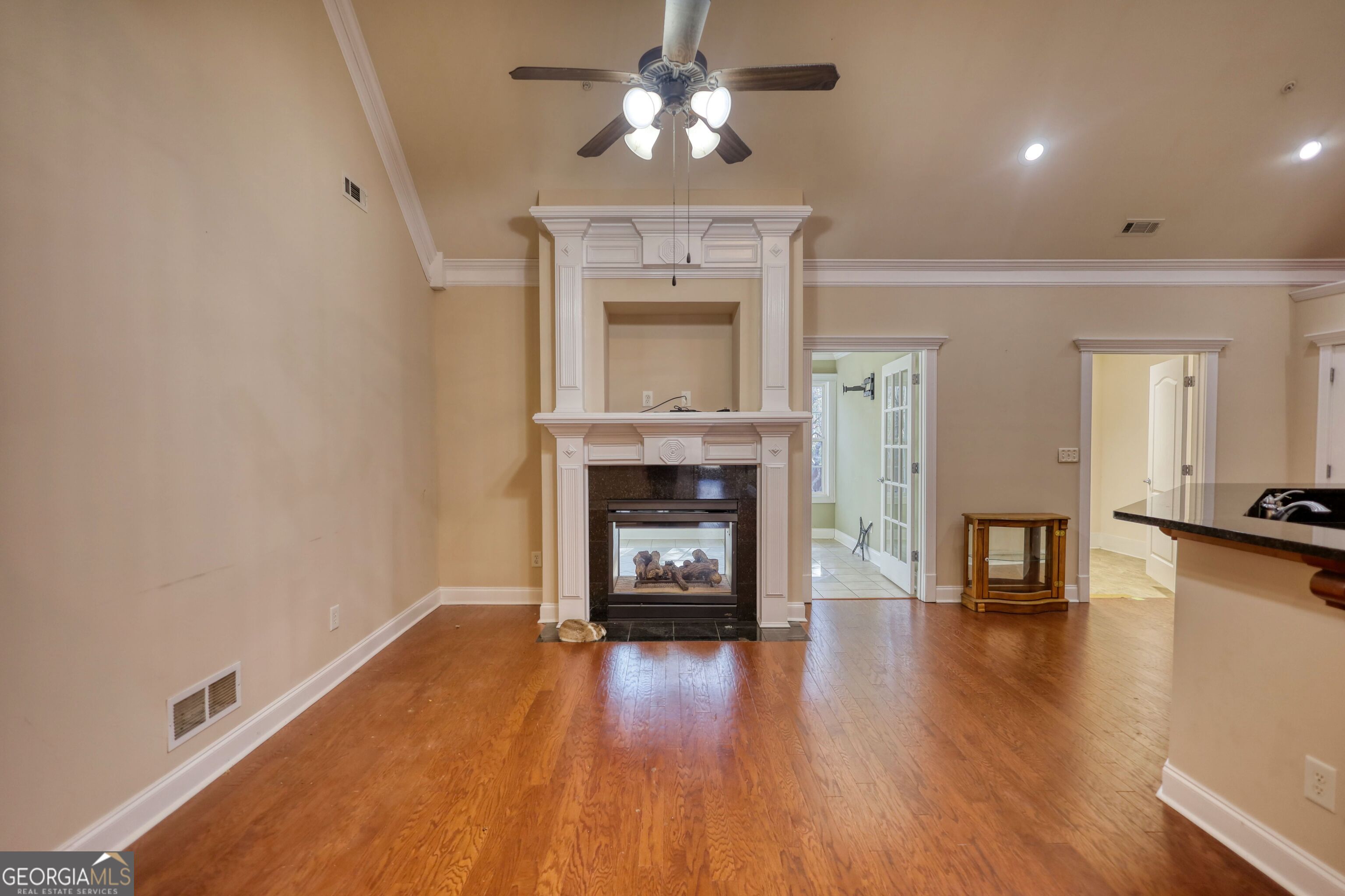 10110 Malcolm Court Covington, GA 30014 - Photo 17 of 60 a living room with furniture and a fireplace
