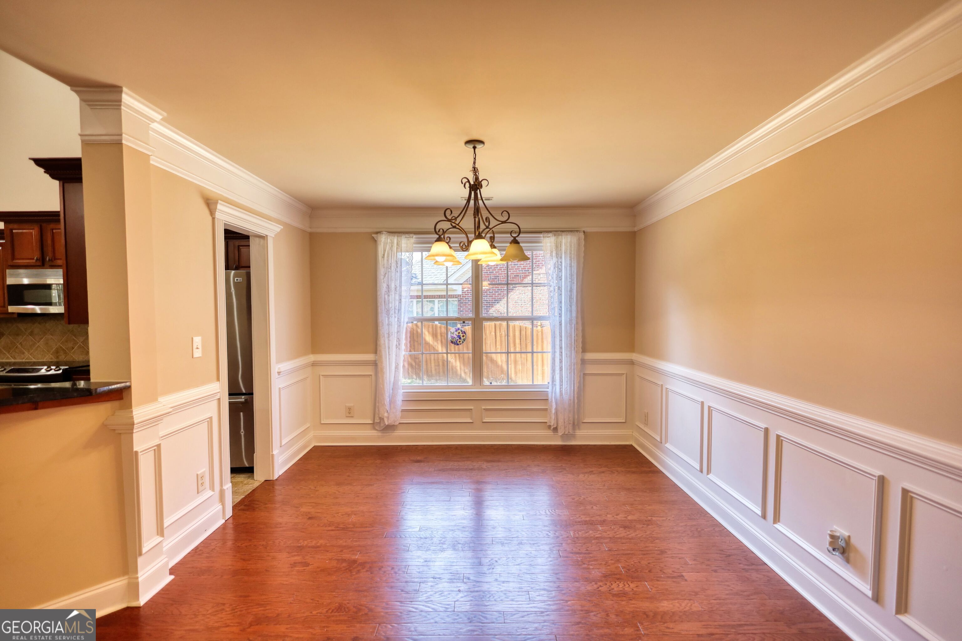 10110 Malcolm Court Covington, GA 30014 - Photo 38 of 60 a view of an empty room with a window