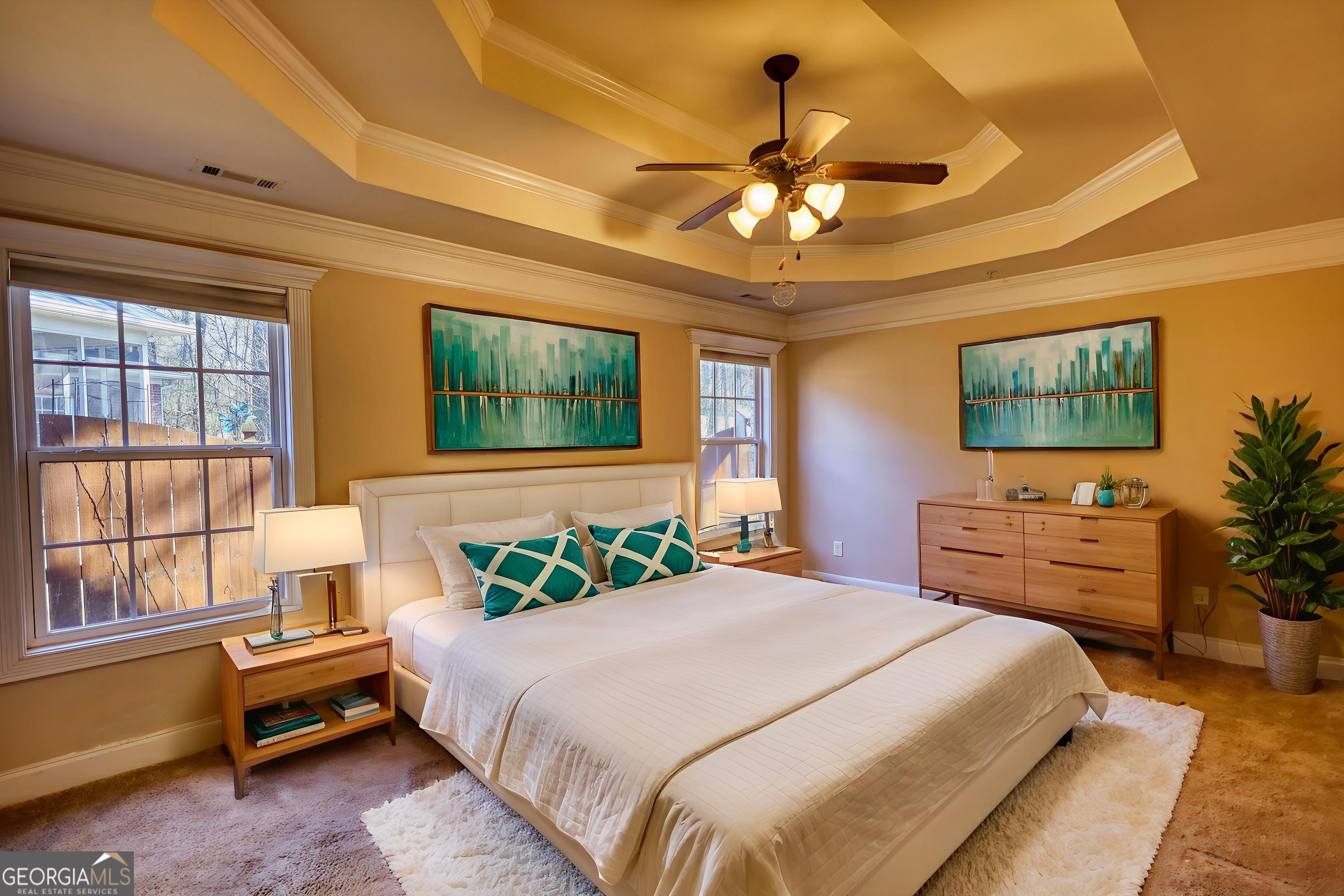 10110 Malcolm Court Covington, GA 30014 - Photo 39 of 60 a bedroom with a bed and a dresser next to a window