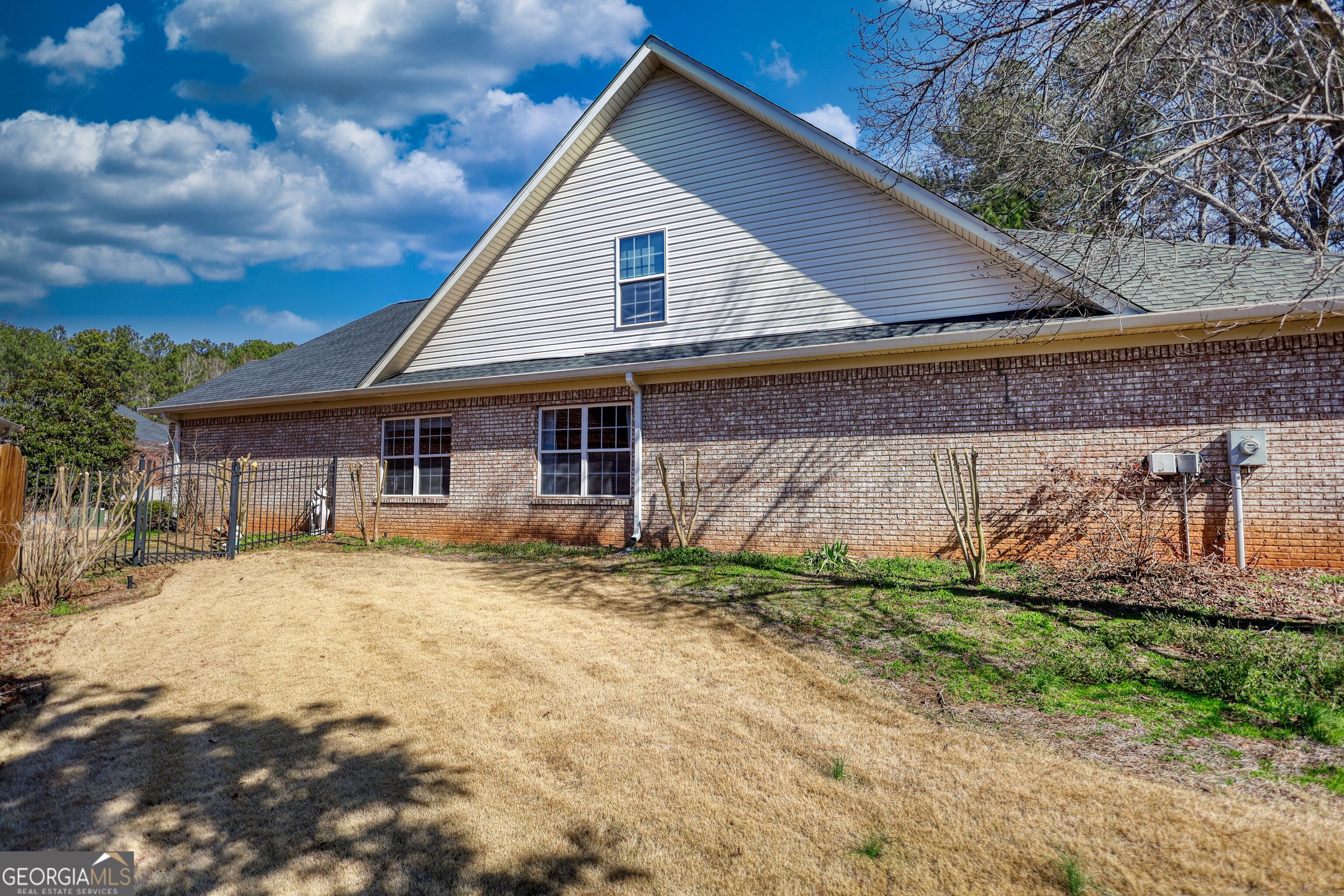 10110 Malcolm Court Covington, GA 30014 - Photo 7 of 60 a view of a house with a yard