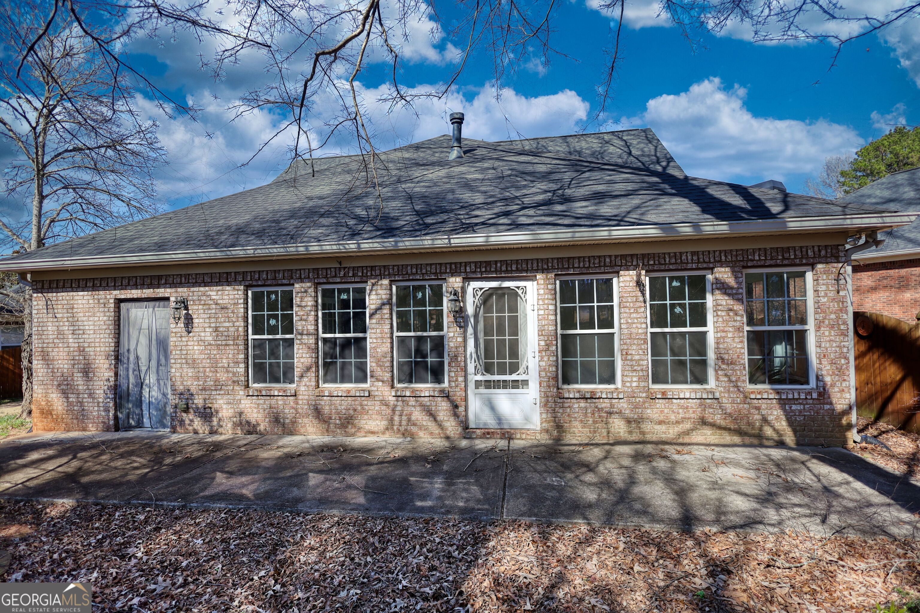 10110 Malcolm Court Covington, GA 30014 - Photo 8 of 60 a front view of a house with garden