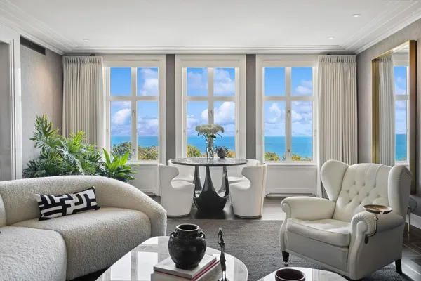 a living room with furniture and a window