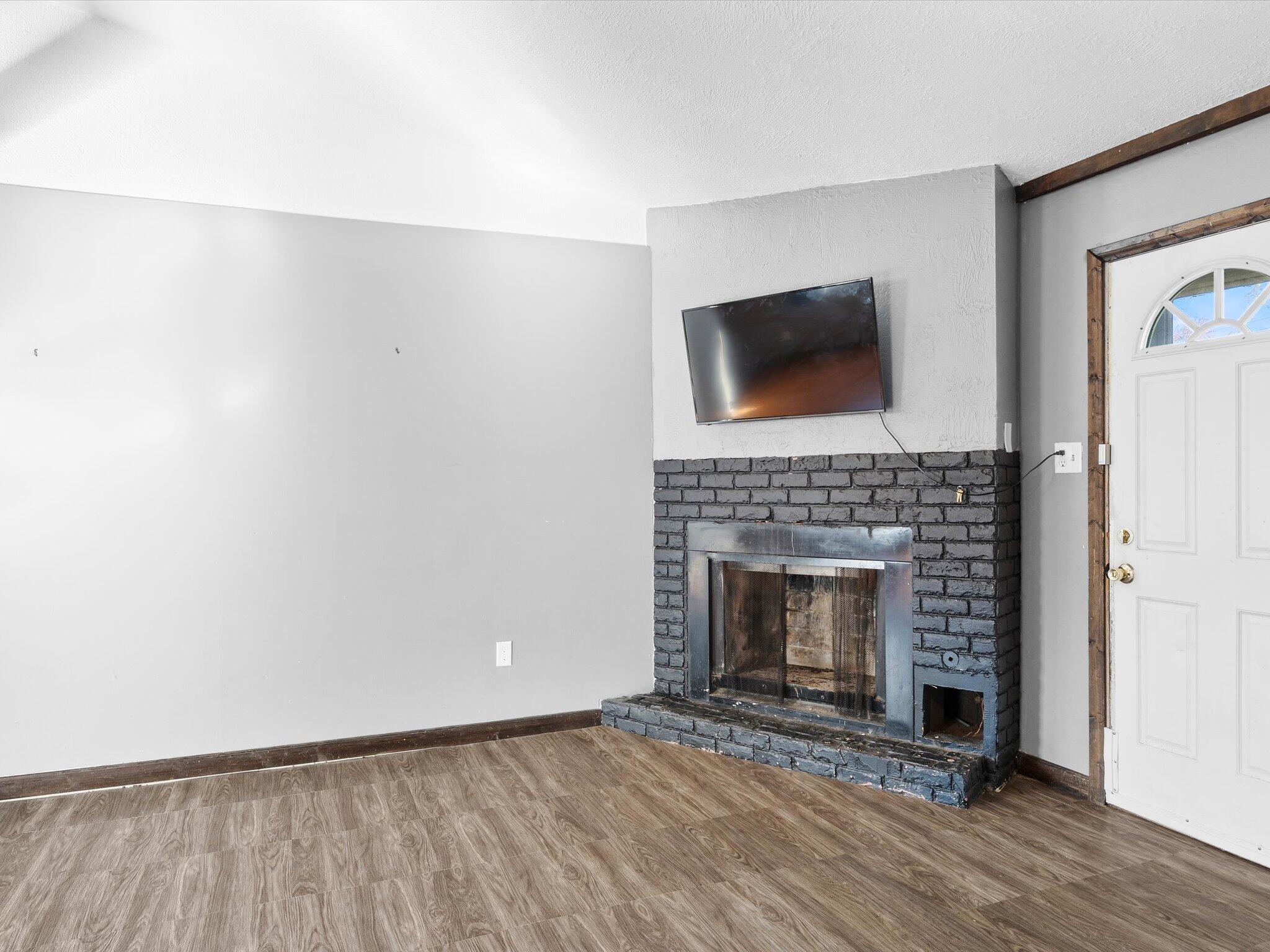 767-1 Heritage Road Valparaiso, IN 46385 - Photo 11 of 20 a living room with a fireplace