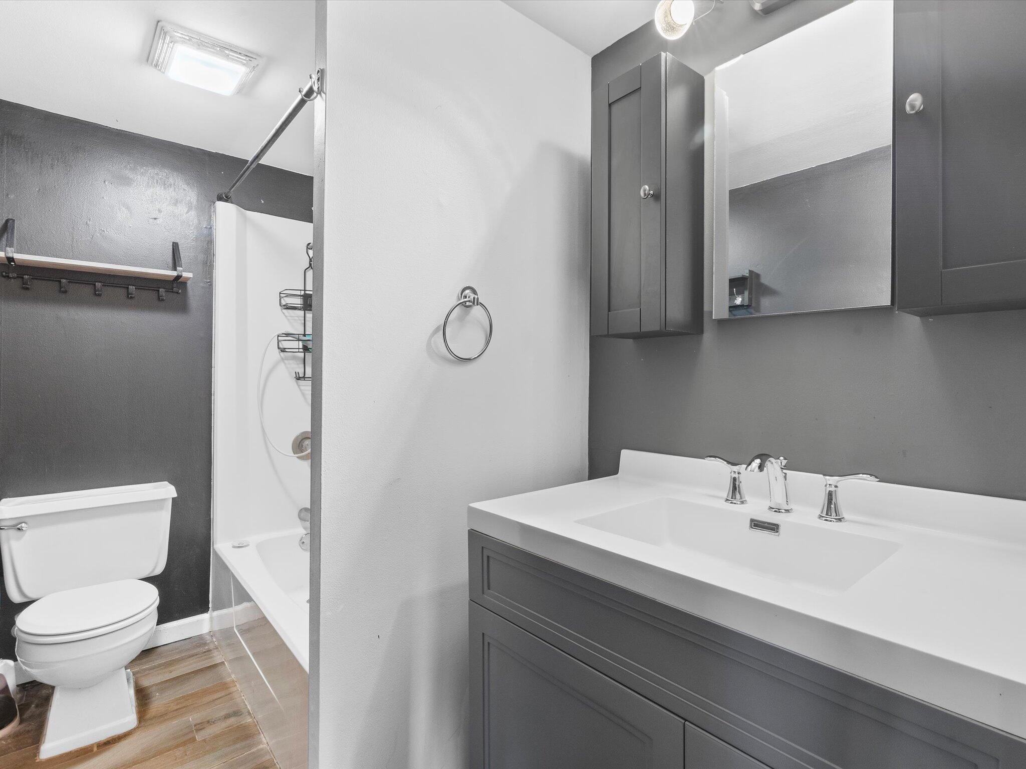767-1 Heritage Road Valparaiso, IN 46385 - Photo 12 of 20 a bathroom with a sink toilet and shower