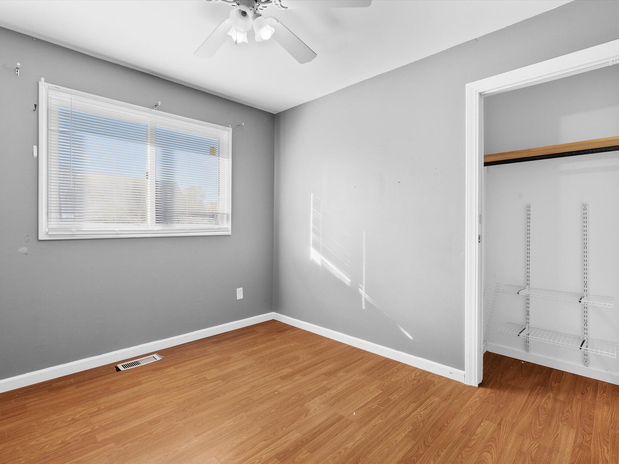767-1 Heritage Road Valparaiso, IN 46385 - Photo 18 of 20 an empty room with wooden floor and windows