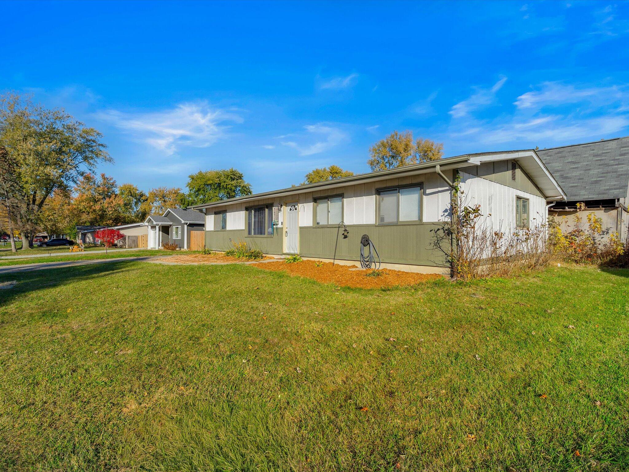 767-1 Heritage Road Valparaiso, IN 46385 - Photo 2 of 20 a view of a house with a big yard