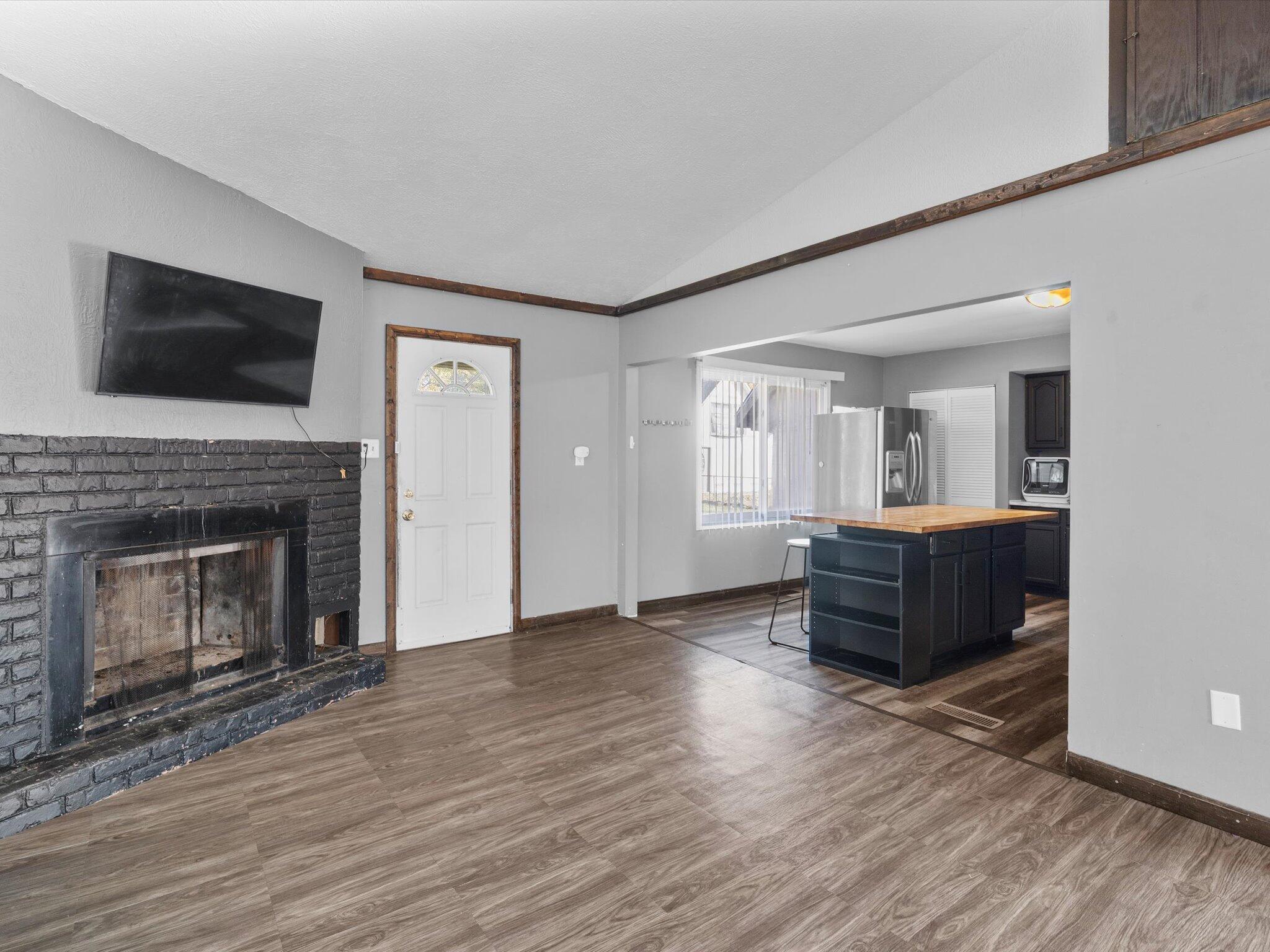 767-1 Heritage Road Valparaiso, IN 46385 - Photo 7 of 20 a living room with furniture and a fireplace