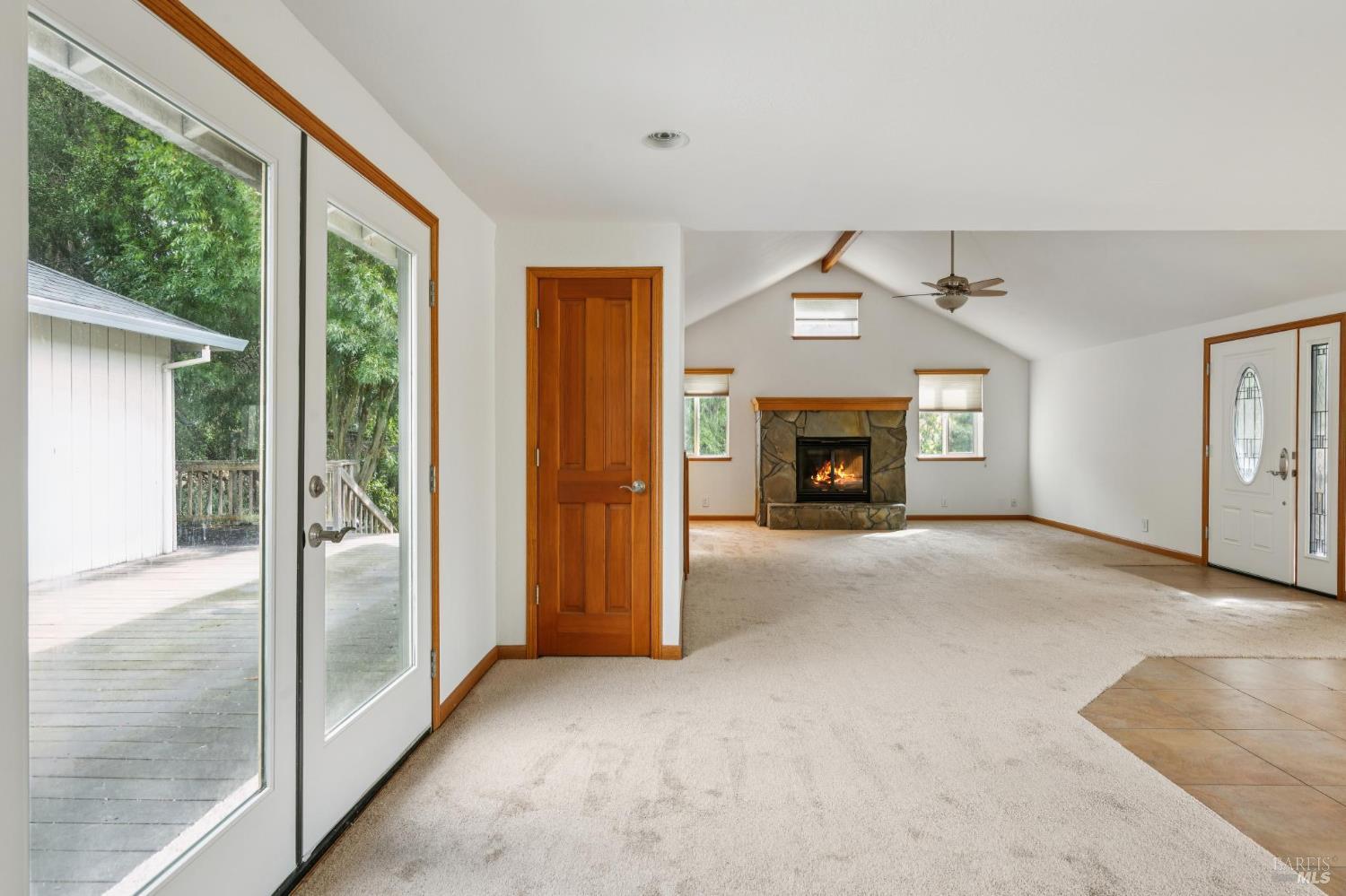 9760 Willow Avenue Cotati, CA 94931 - Photo 38 of 63 a view of a livingroom with a fireplace wooden floor and window