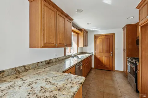 a view of empty room with windows