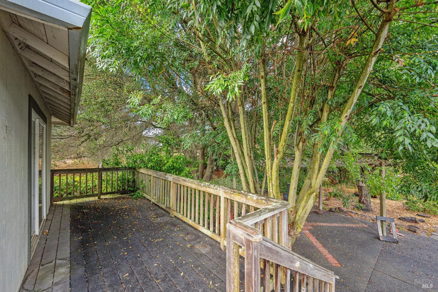 9760 Willow Avenue Cotati, CA 94931 - Photo 53 of 63 a view of a porch with wooden floor and fence