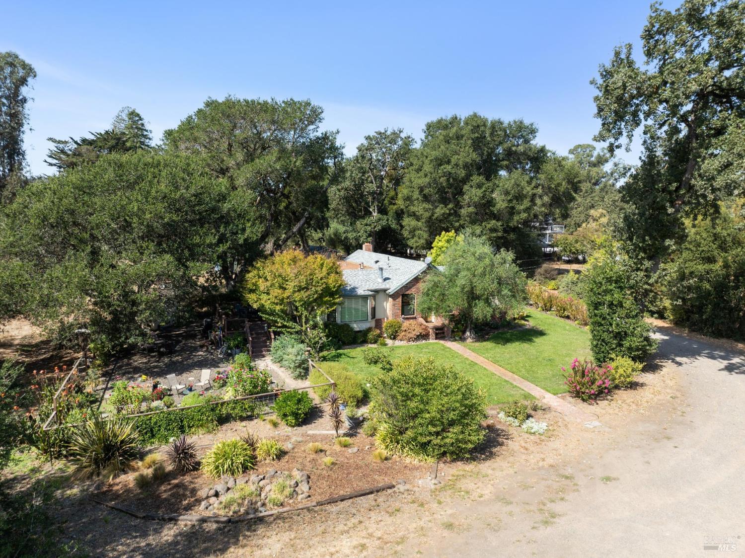 9760 Willow Avenue Cotati, CA 94931 - Photo 62 of 63 a view of a garden with pathway