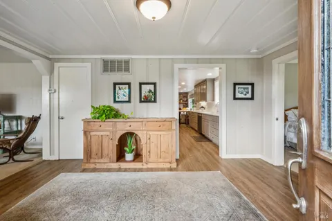a view of livingroom with furniture and wooden floor