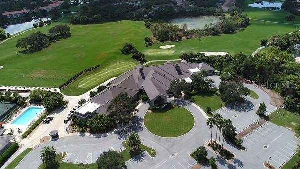 9641 Castle Point Drive, Unit 1215 Sarasota, FL 34238 - Photo 29 of 48 an aerial view of a house