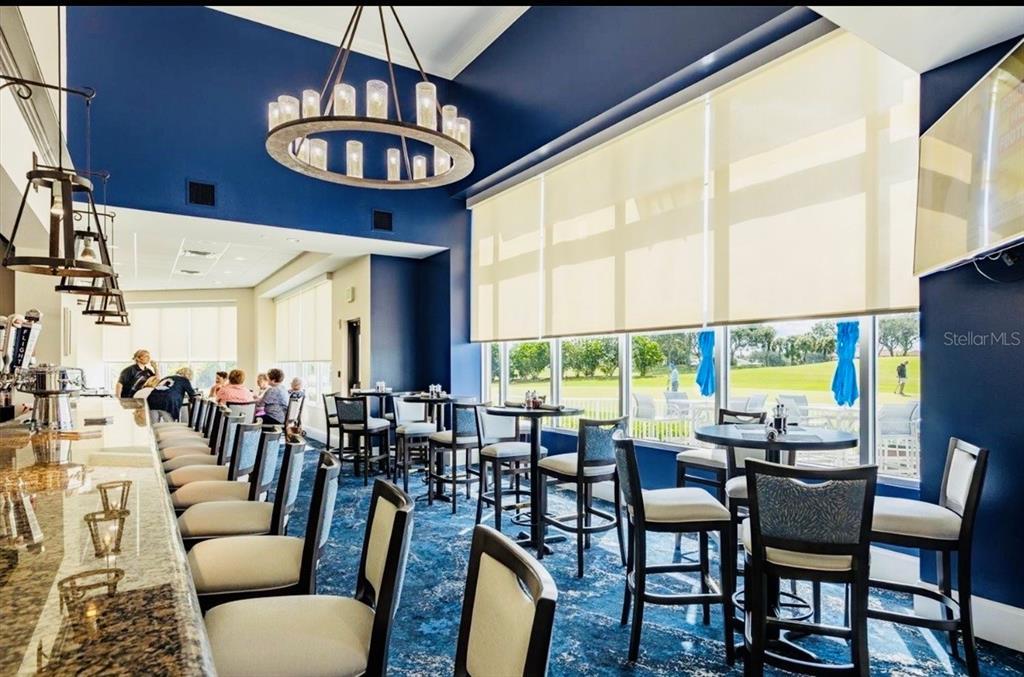9641 Castle Point Drive, Unit 1215 Sarasota, FL 34238 - Photo 33 of 48 a view of a dining room with furniture window and outside view