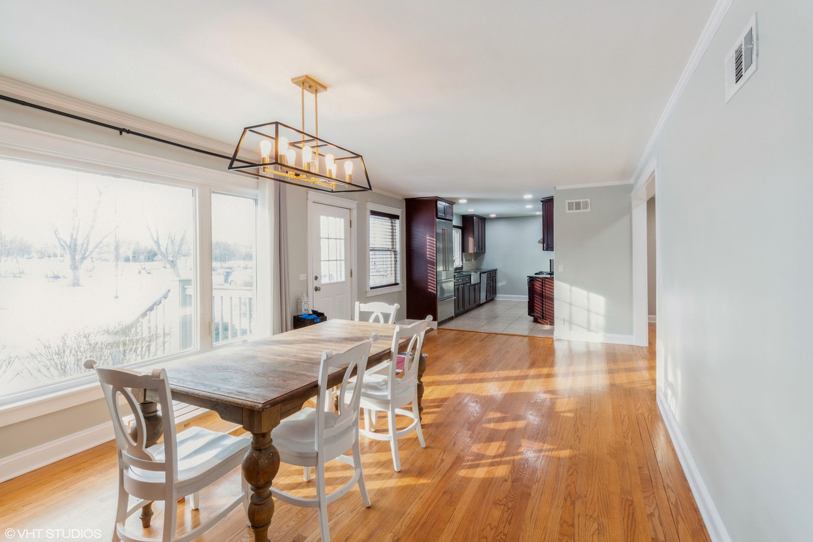 45 Haman Road Inverness, IL 60067 - Photo 2 of 11 a view of a dining room with furniture window and wooden floor
