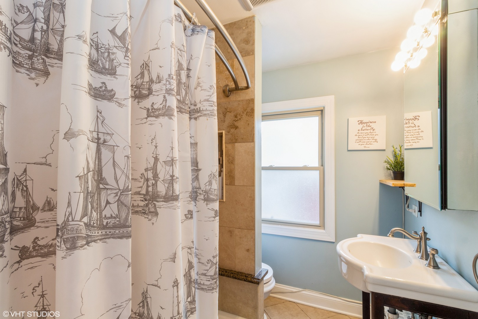 45 Haman Road Inverness, IL 60067 - Photo 8 of 11 a bathroom with a sink a toilet and shower