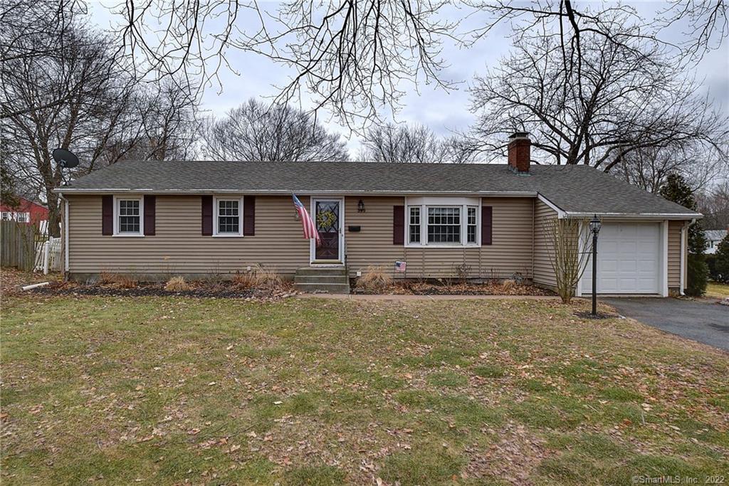 front view of house with a yard