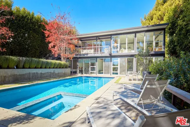 a view of a house with a swimming pool