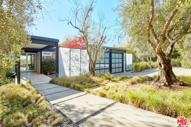 a view of house with yard