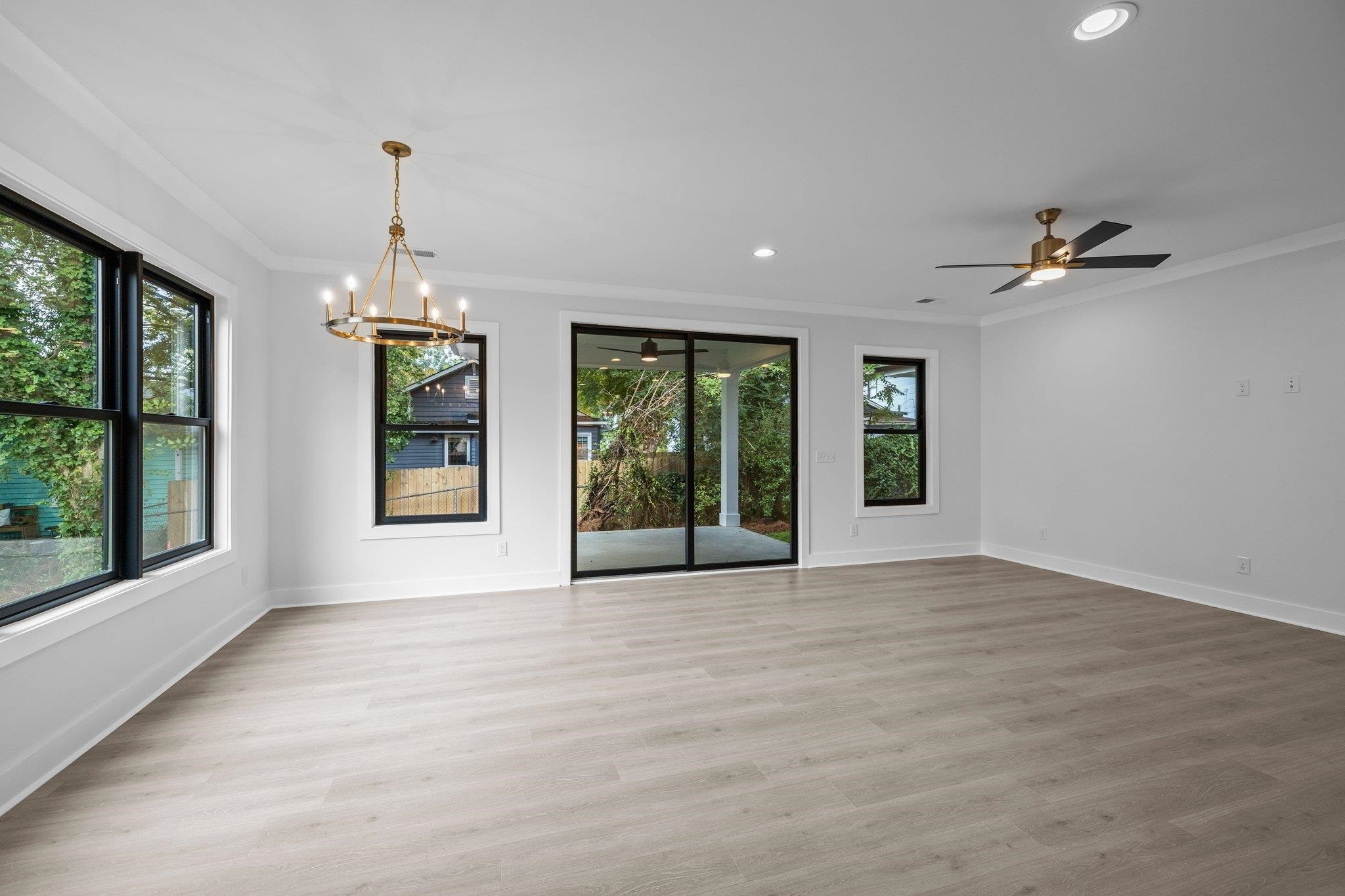 1112 Pender Street Raleigh, NC 27610 - Photo 16 of 56 a view of an empty room with a window