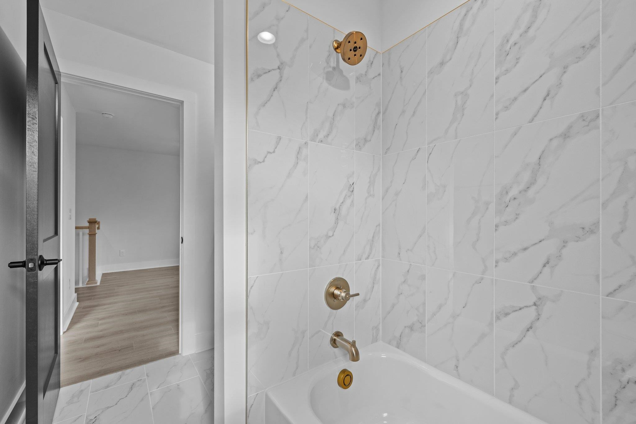 1112 Pender Street Raleigh, NC 27610 - Photo 27 of 56 a bathroom with a tub