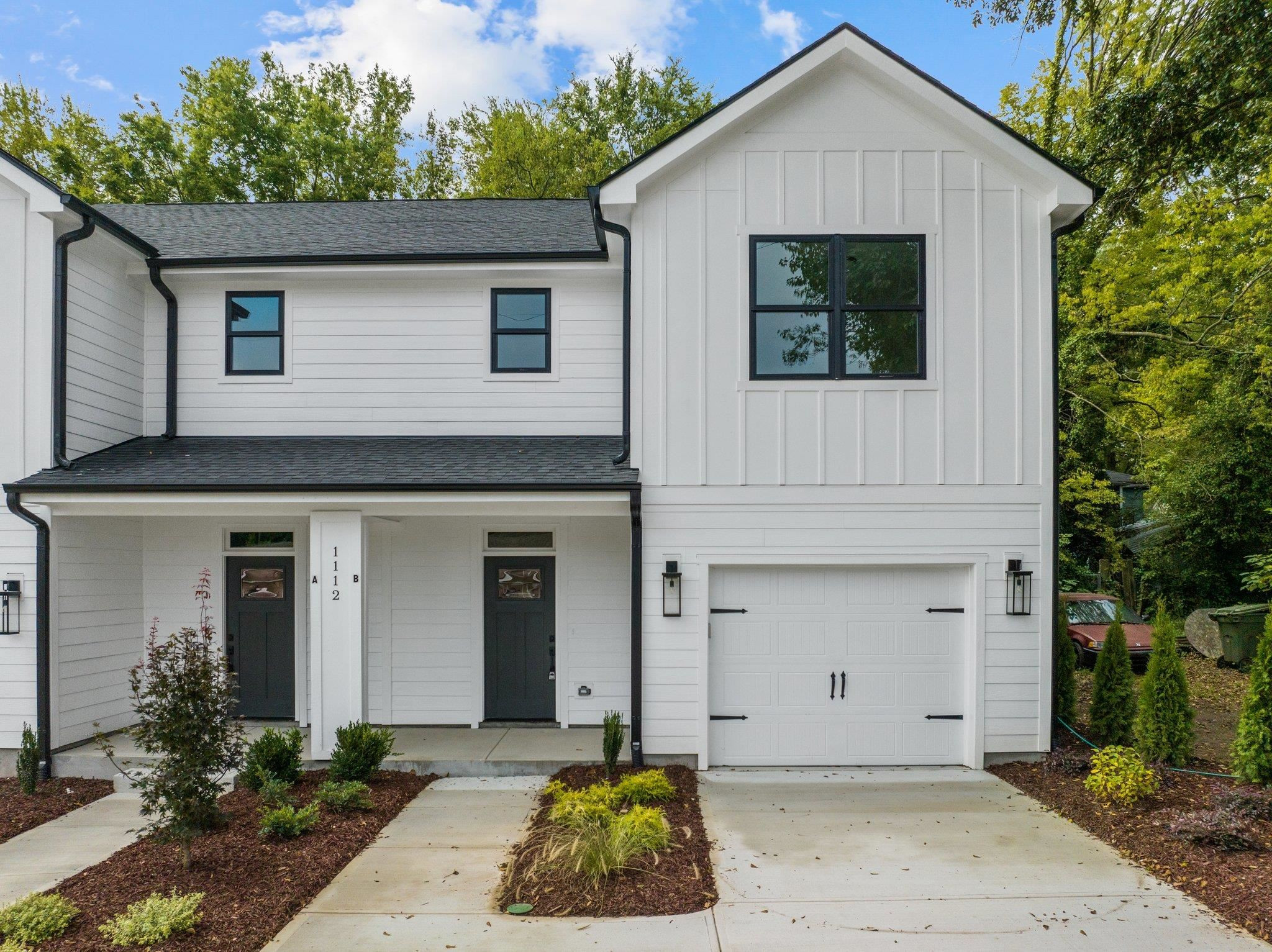 1112 Pender Street Raleigh, NC 27610 - Photo 46 of 56 a front view of a house with a yard