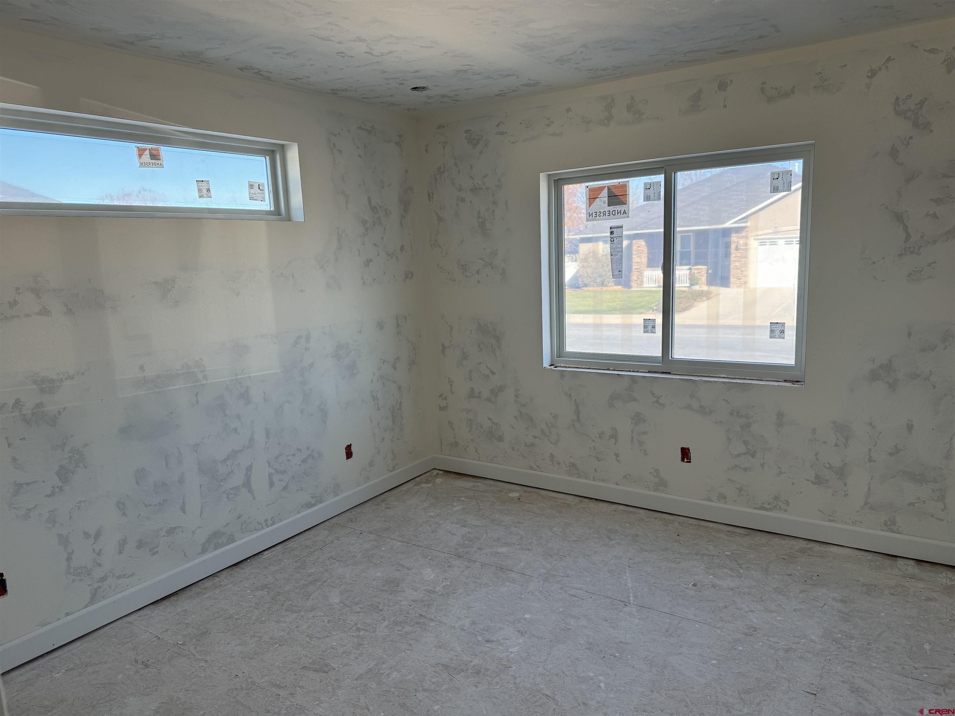 1746 Lynx Street Delta, CO 81416 - Photo 6 of 13 an empty room with a window