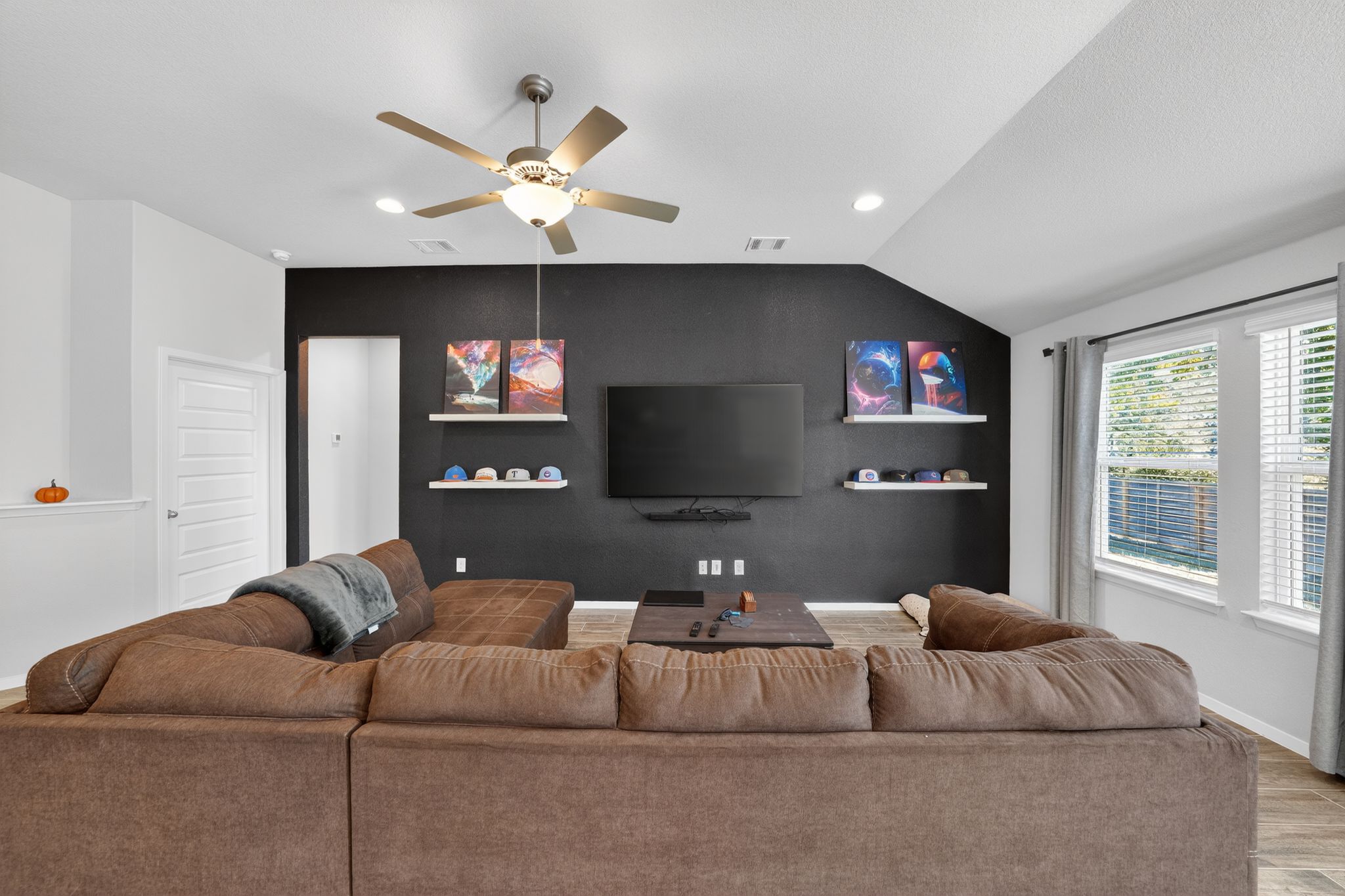 20703 Ridgeview Road Lago Vista, TX 78645 - Photo 11 of 30 a living room with furniture and a flat screen tv