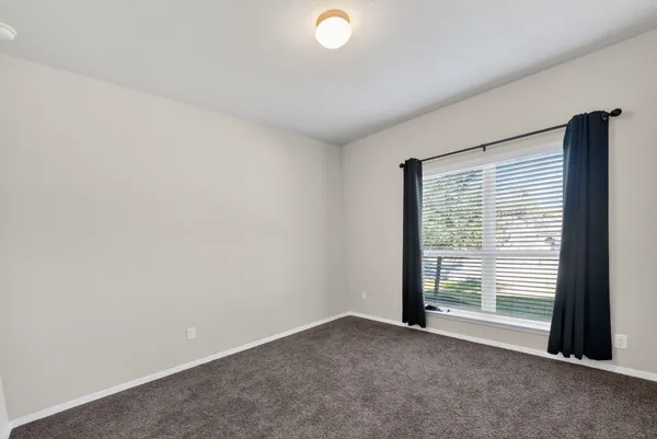 an empty room with an entryway