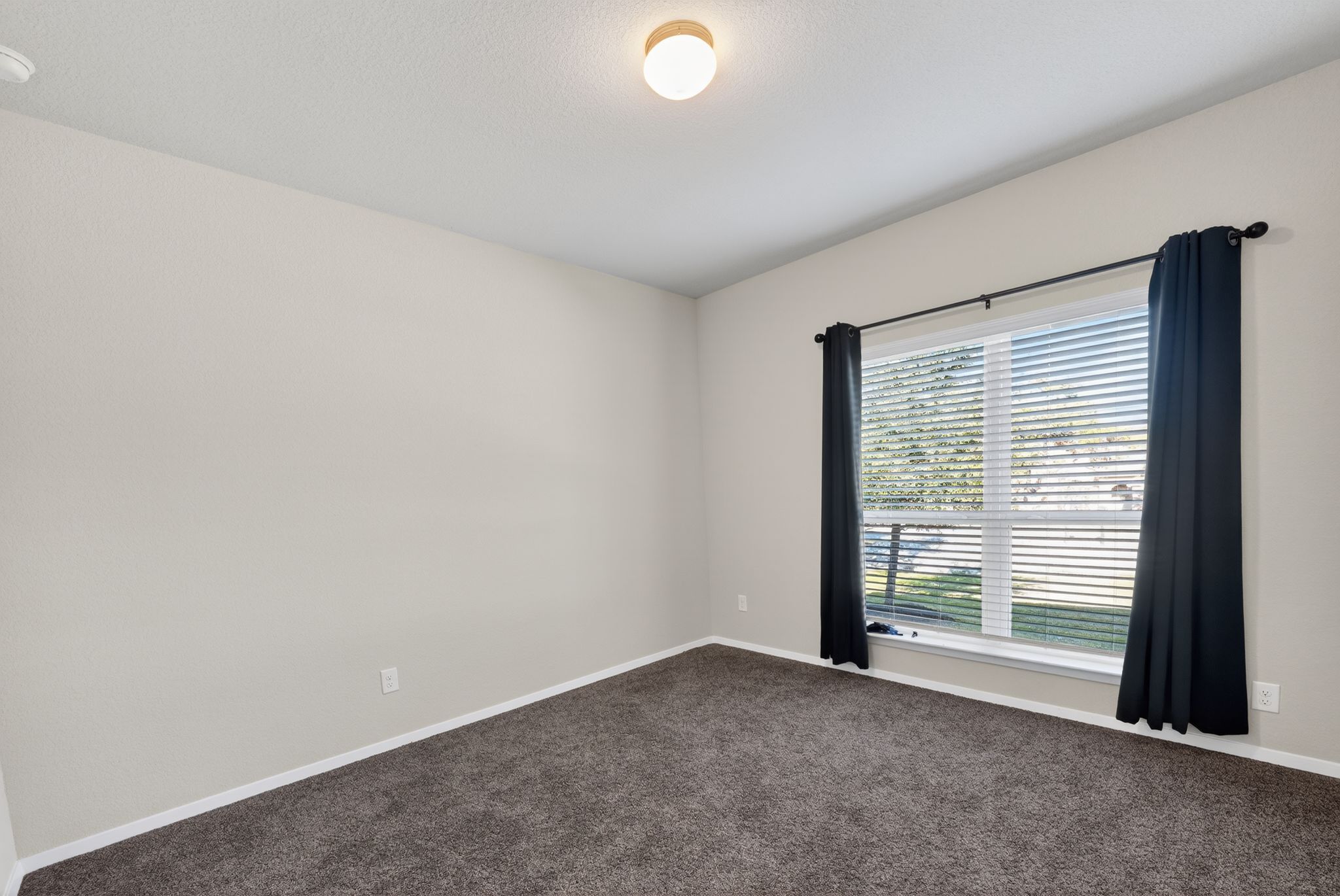 20703 Ridgeview Road Lago Vista, TX 78645 - Photo 21 of 30 a view of a livingroom with an empty space and a window